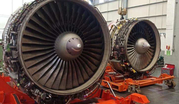 Aircraft engine undergoing inspection during engine transition support